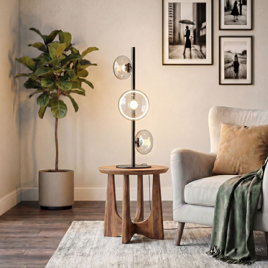 Decor floor lamp placed beside an armchair in a cozy living room corner with warm ambient lighting.