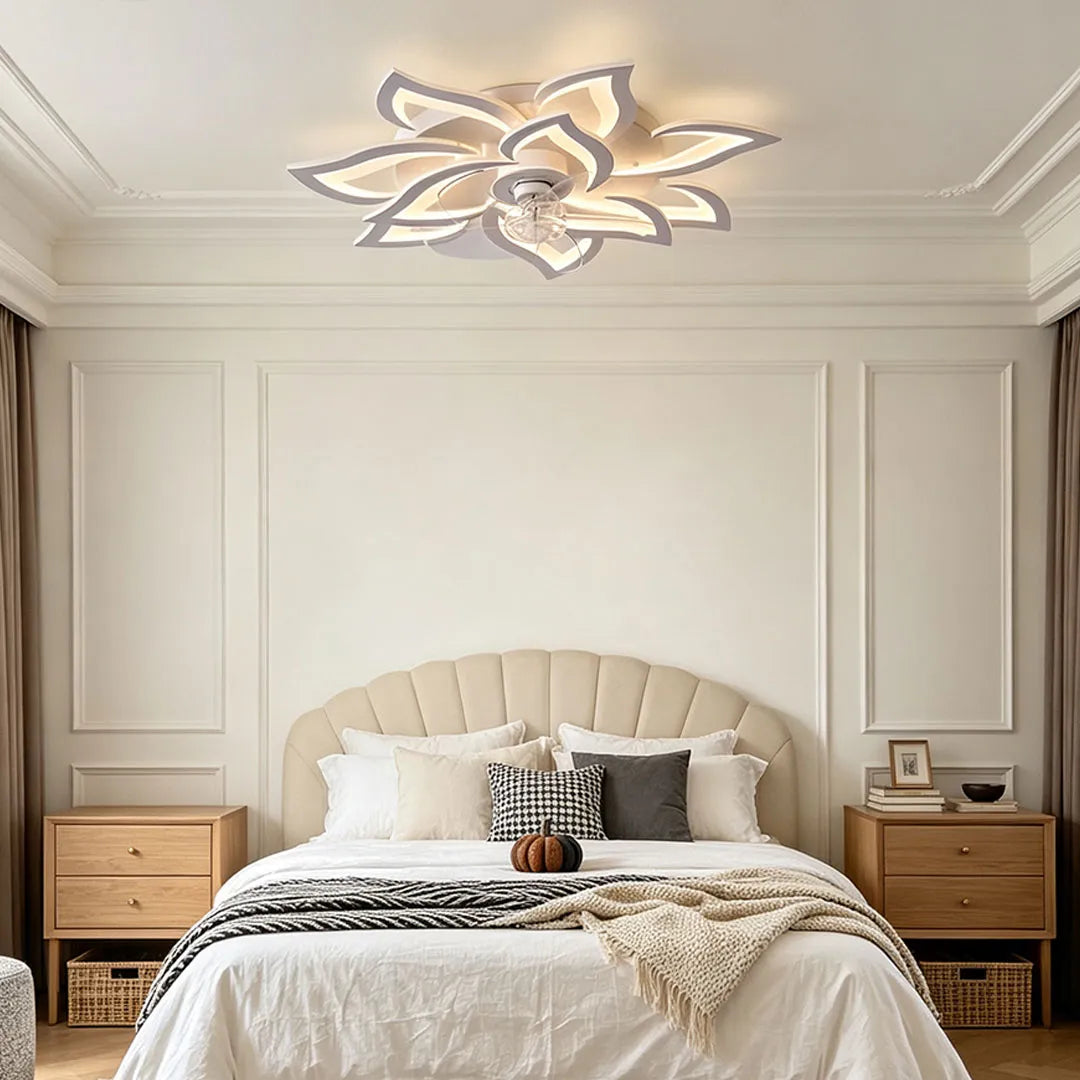 Decorative ceiling fans with lights featuring a floral-inspired blade design and modern LED illumination in a bedroom.