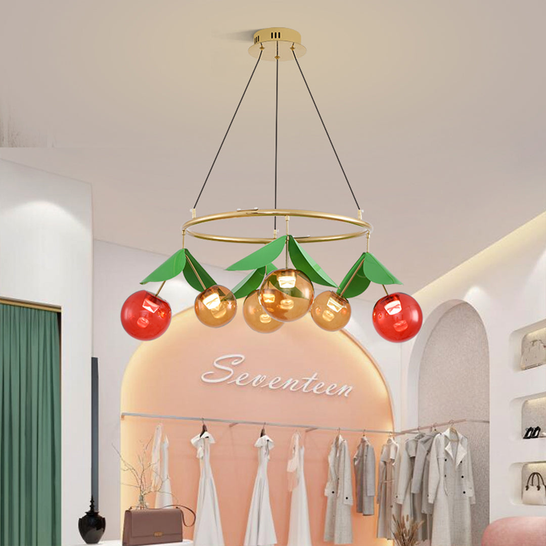 Decorative cherry light fixture illuminating modern retail or boutique space with clothing displays