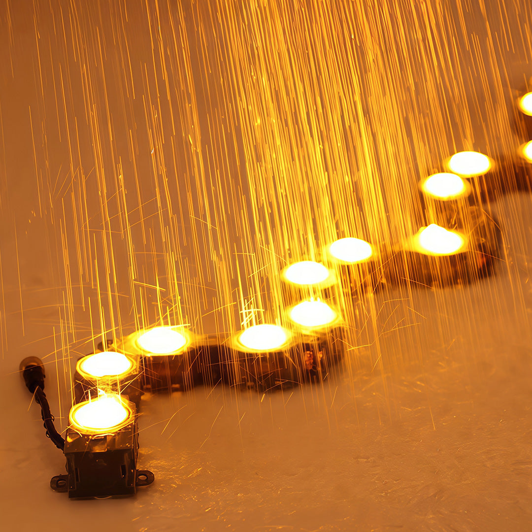 Decorative DIY wall wash lighting featuring glass shade chandelier aesthetic in waterfall curtain creating stunning visual effect.