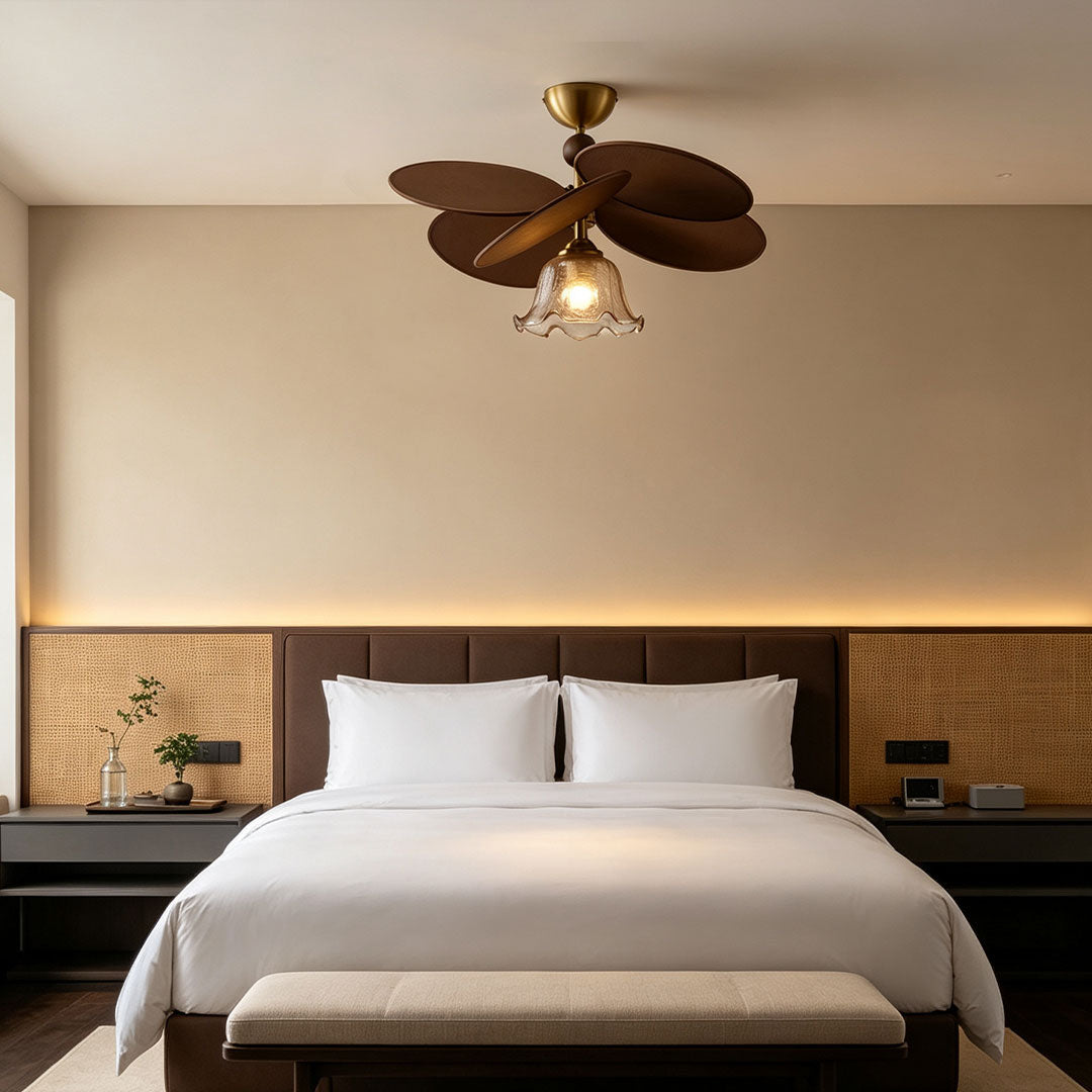 Decorative flush mount ceiling light with petal-inspired design illuminating a modern bedroom with warm ambient lighting.