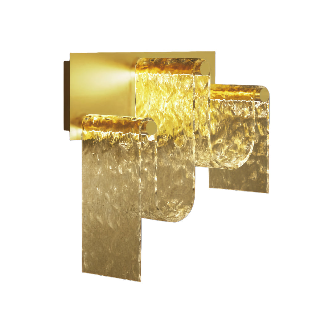 Decorative gold wall light with layered organic glass design and warm metallic finish shown in detail