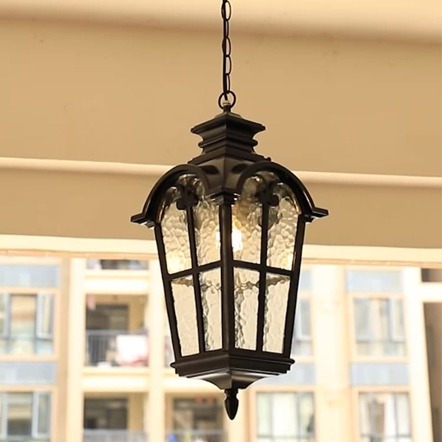 Large decorative hanging lantern with cross-hatched glass creating inviting indoor ambiance