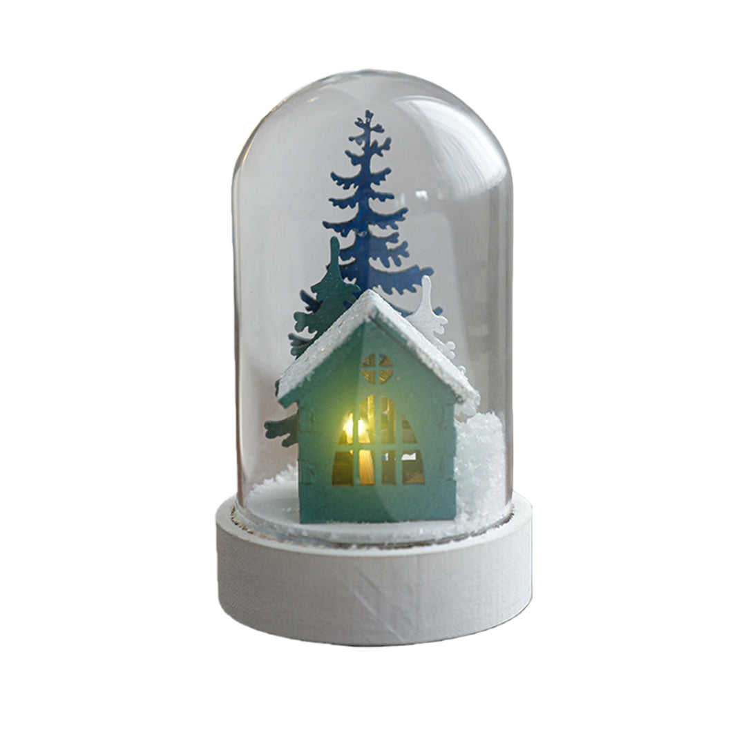 Decorative led table lamp featuring miniature green cottage with illuminated interior under protective glass cover