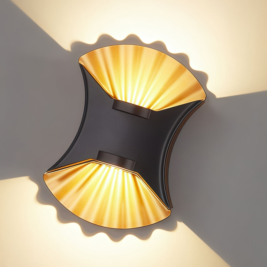 Decorative outdoor up down wall light with black curved body and dramatic ambient beam effect.