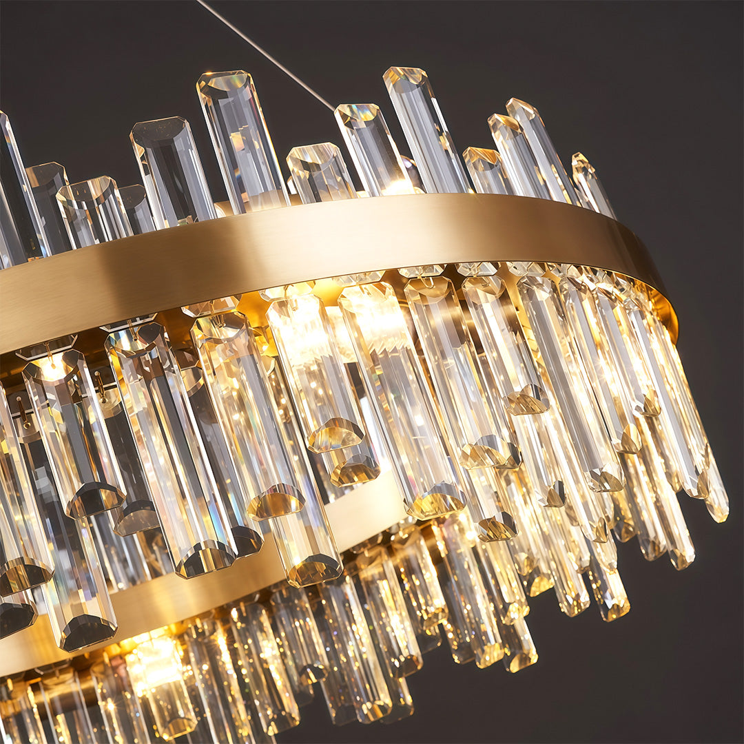 Modern luxury chandeliers close-up showcasing brass frame and crystal glass rod detail