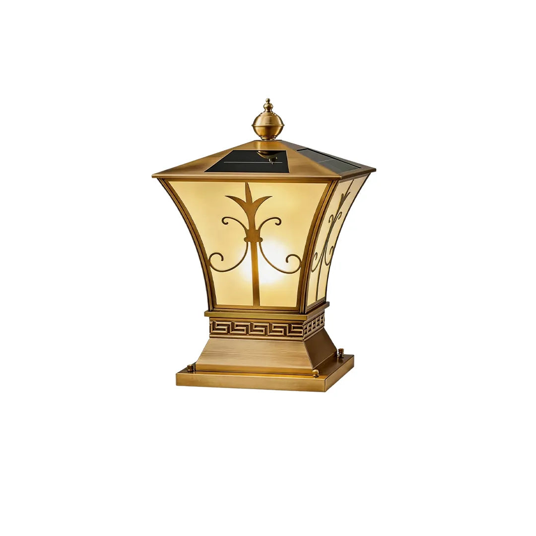 Decorative solar pillar lantern with brass finish palm leaf pattern and warm glow