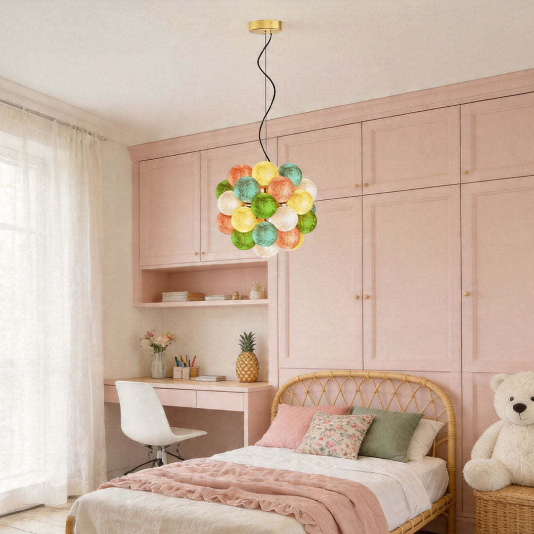 Decorative stained glass chandelier installed in a cozy bedroom with soft colorful lighting.