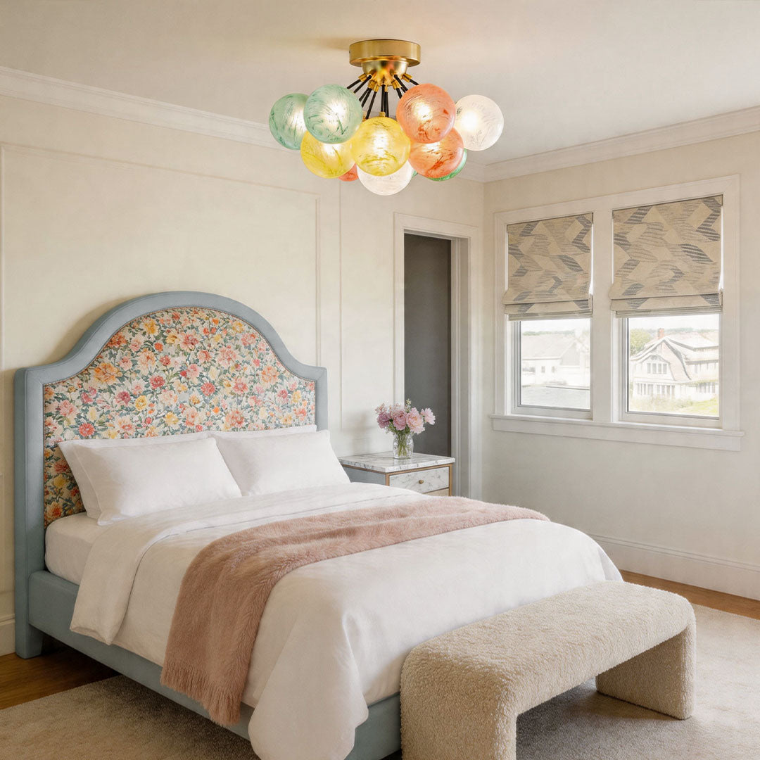 Decorative stained glass flush mount light in a bedroom with soft colorful glow and cozy interior design.