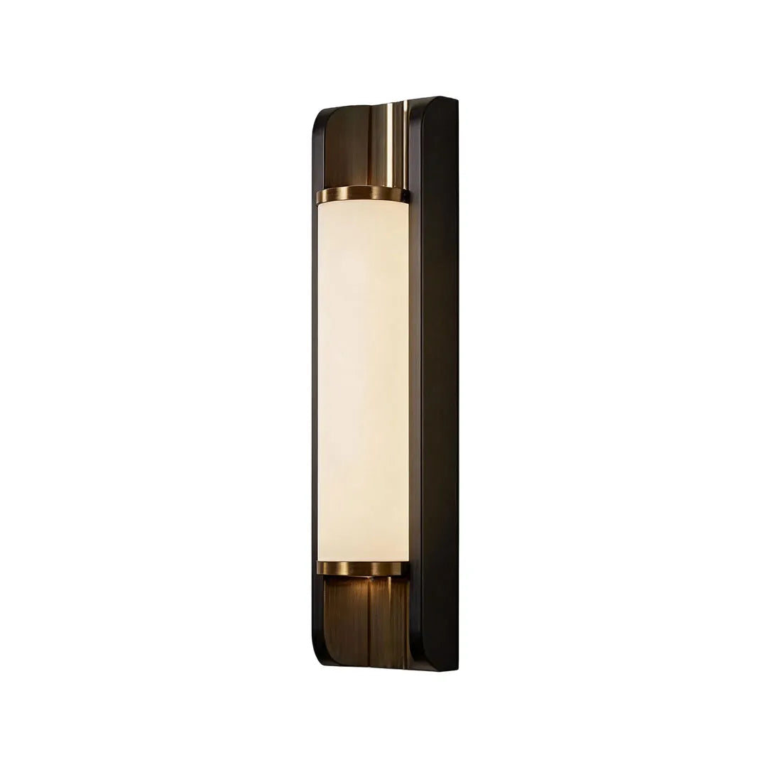 Modern up down outdoor wall sconce with decorative bronze trim and frosted diffuser.