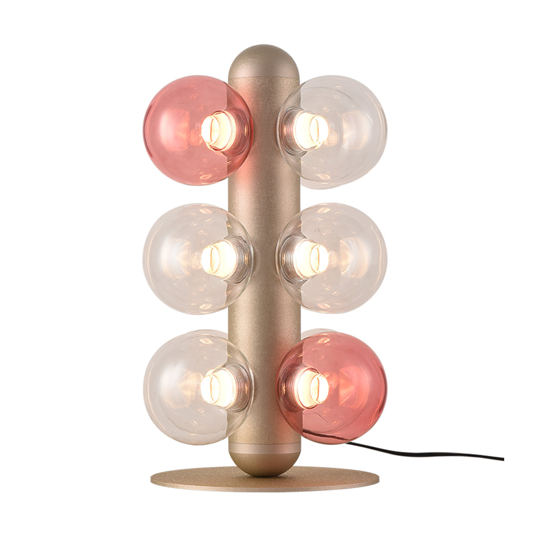 Decorative bubble table lamp with varied sphere sizes providing warm ambient room lighting