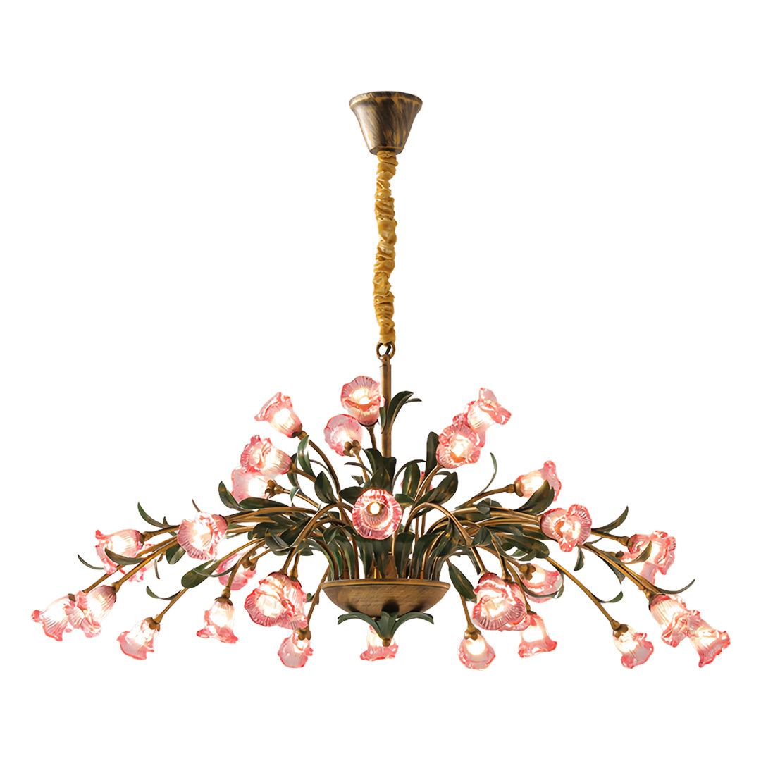 Decorative vintage floral chandelier with pink glass petals creating warm ambient lighting in elegant interior