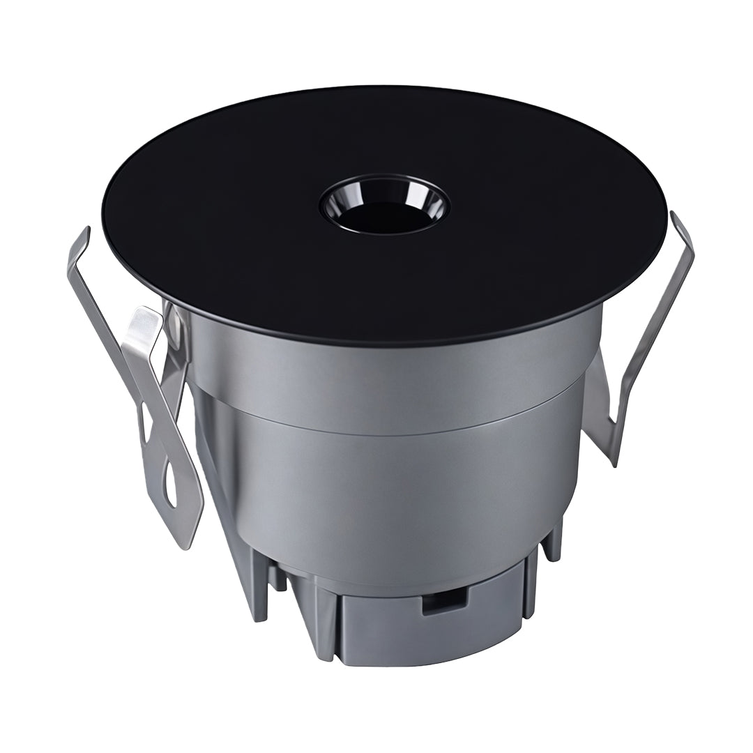 Deep recess LED spotlight with black aperture and silver body for focused directional lighting