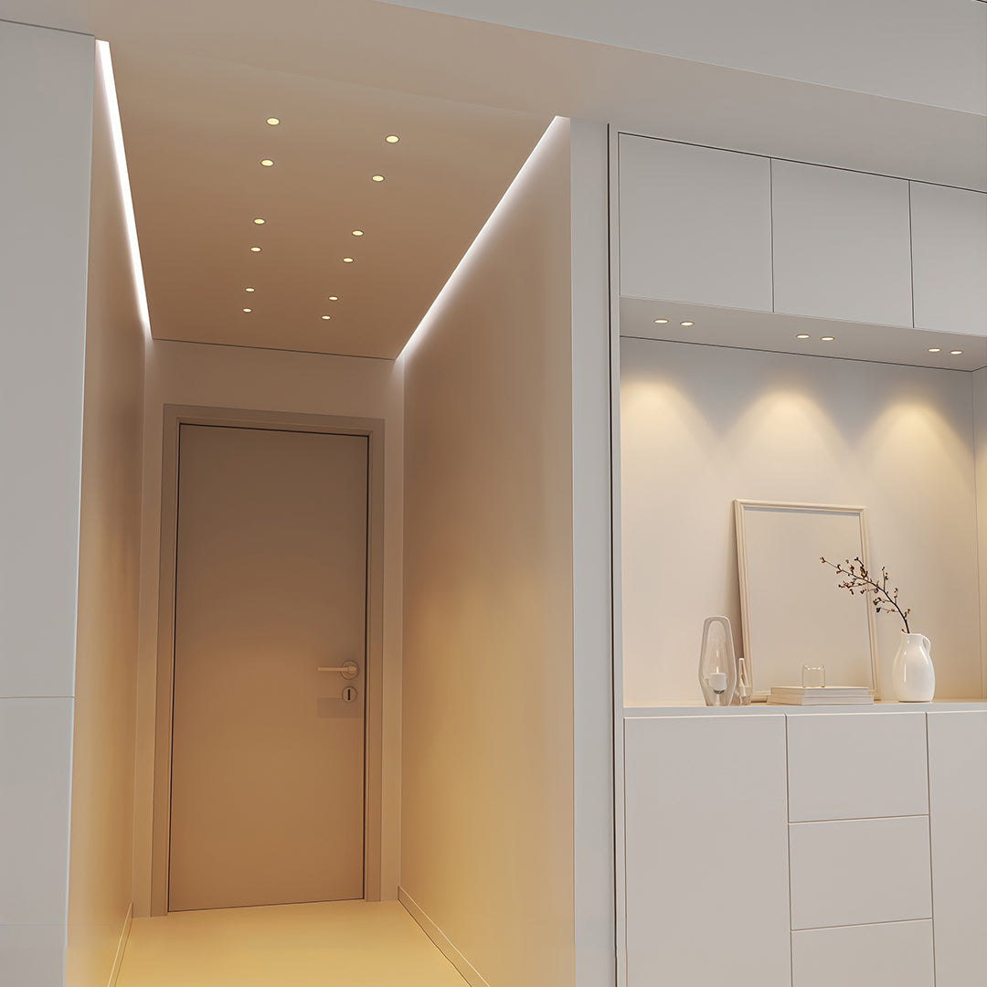 Deep-set black glass shade chandelier downlight installed in contemporary ceiling design.