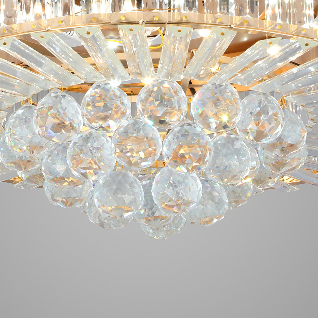 Densely packed hanging crystal ceiling fans with lights with gold metal framing detail 