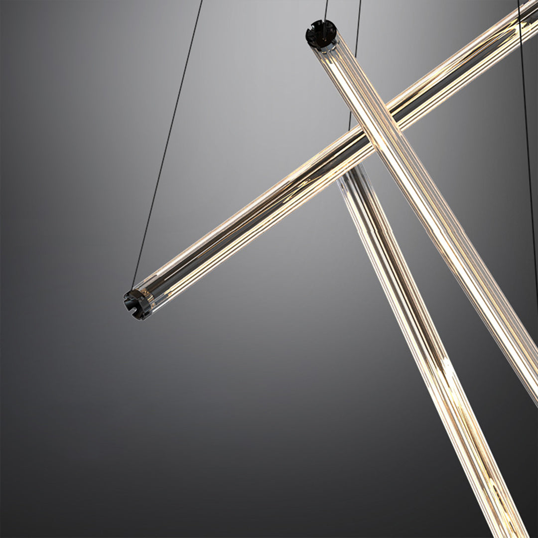 Designer LED linear chandelier with crossed bar geometry adding architectural interest to interior