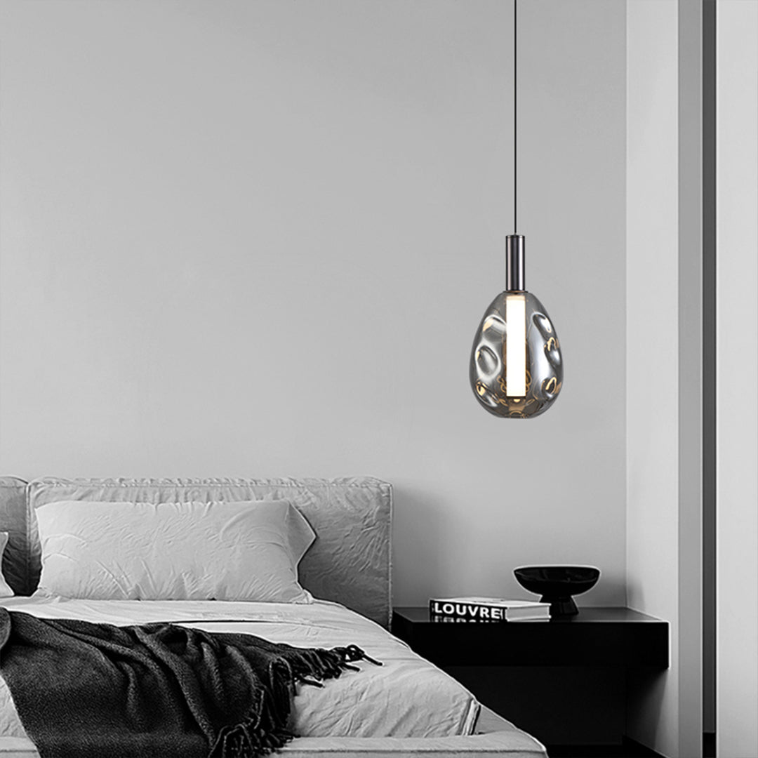 Designer drum pendant lights creating dramatic lighting effects in modern living space