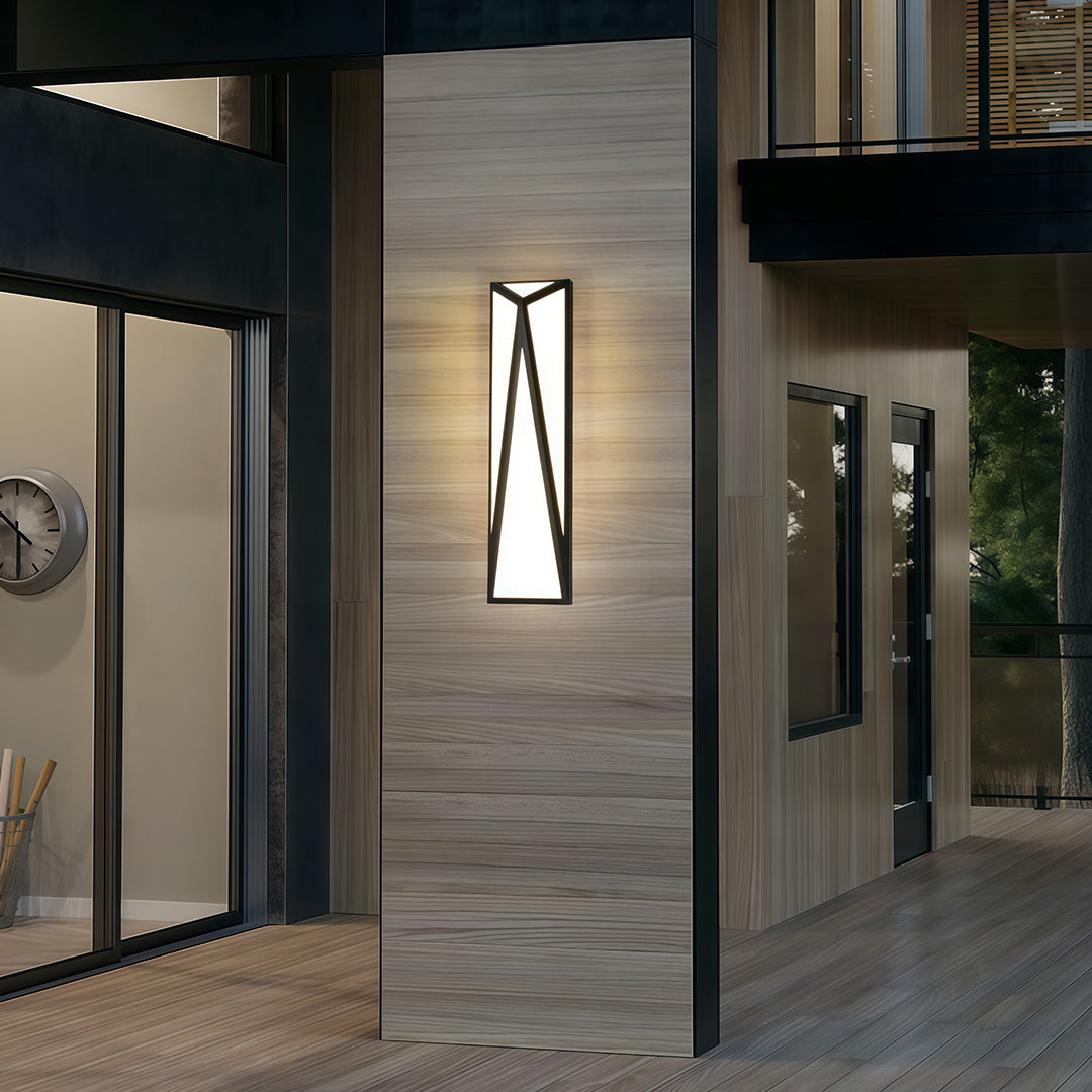 Designer exterior wall light black featuring glass shade chandelier aesthetic providing ambient lighting in contemporary commercial corridor.