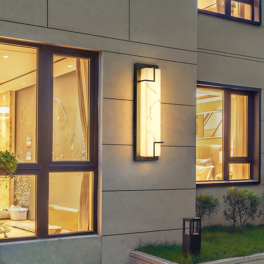 Designer exterior wall lights black featuring glass shade chandelier aesthetic providing ambient lighting on modern gray exterior facade.