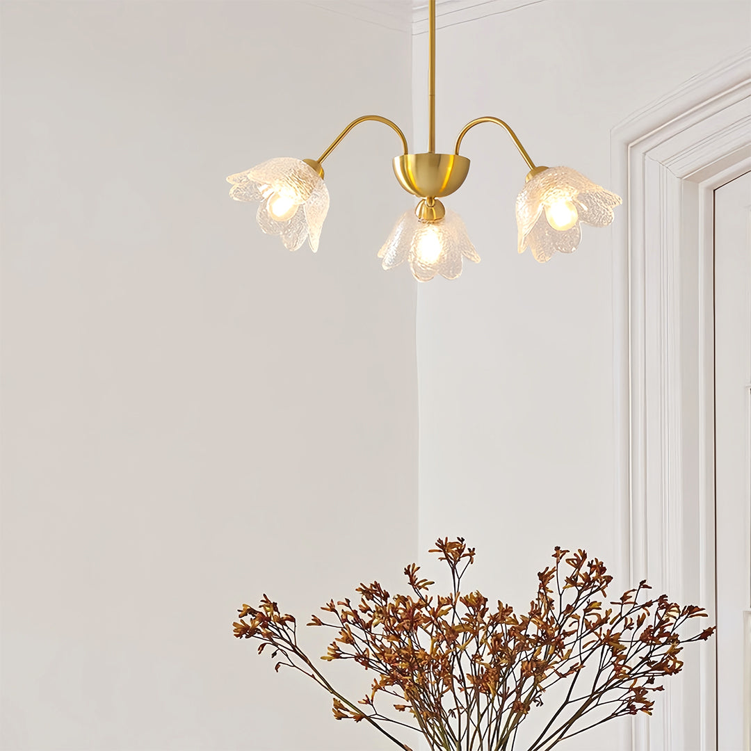 Designer glass shades chandelier displayed in contemporary living space with natural lighting