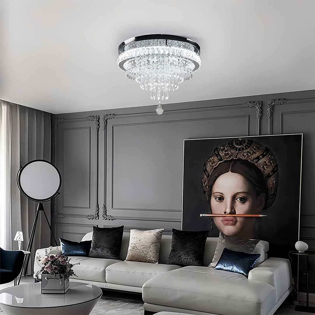 Designer gold flush mount light in modern living space with gray furniture and artistic wall decor