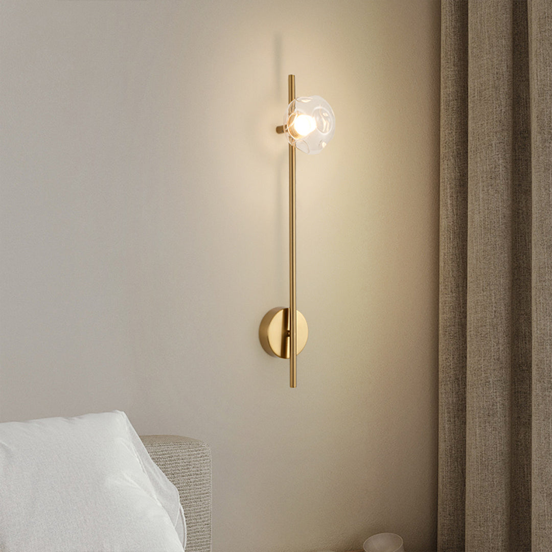 Designer indoor wall mounted lights with gold finish providing elegant bedroom accent lighting