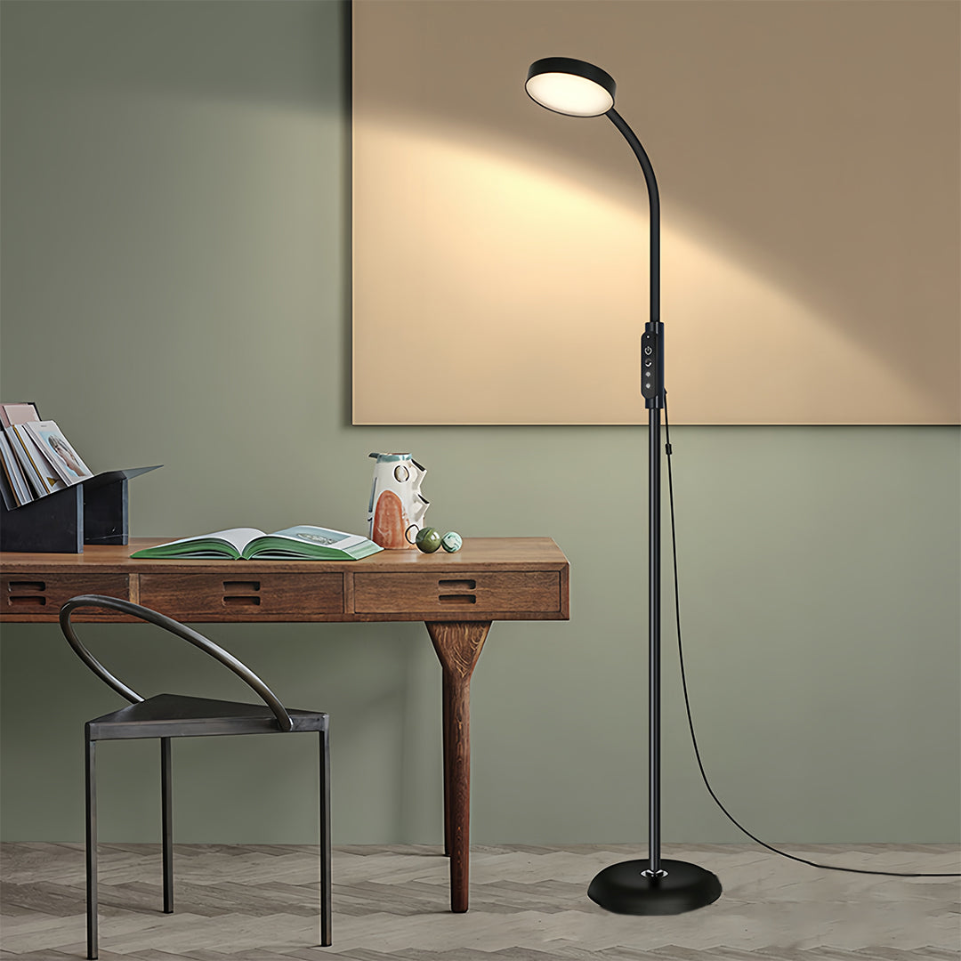 Designer led reading floor lamp in modern kitchen workspace providing focused task illumination