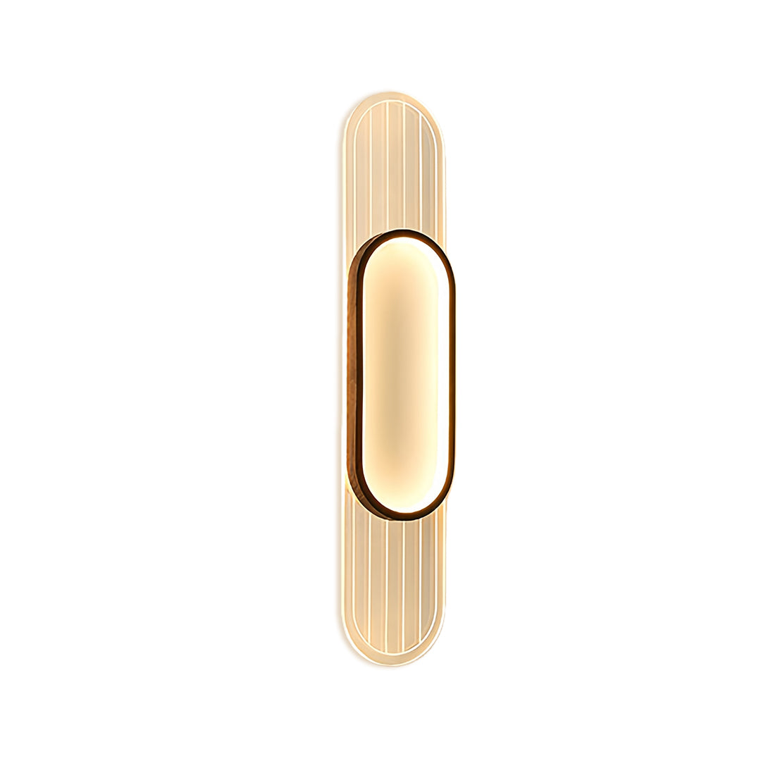Designer linear led wall light with capsule form in polished gold and distinctive vertical line accents