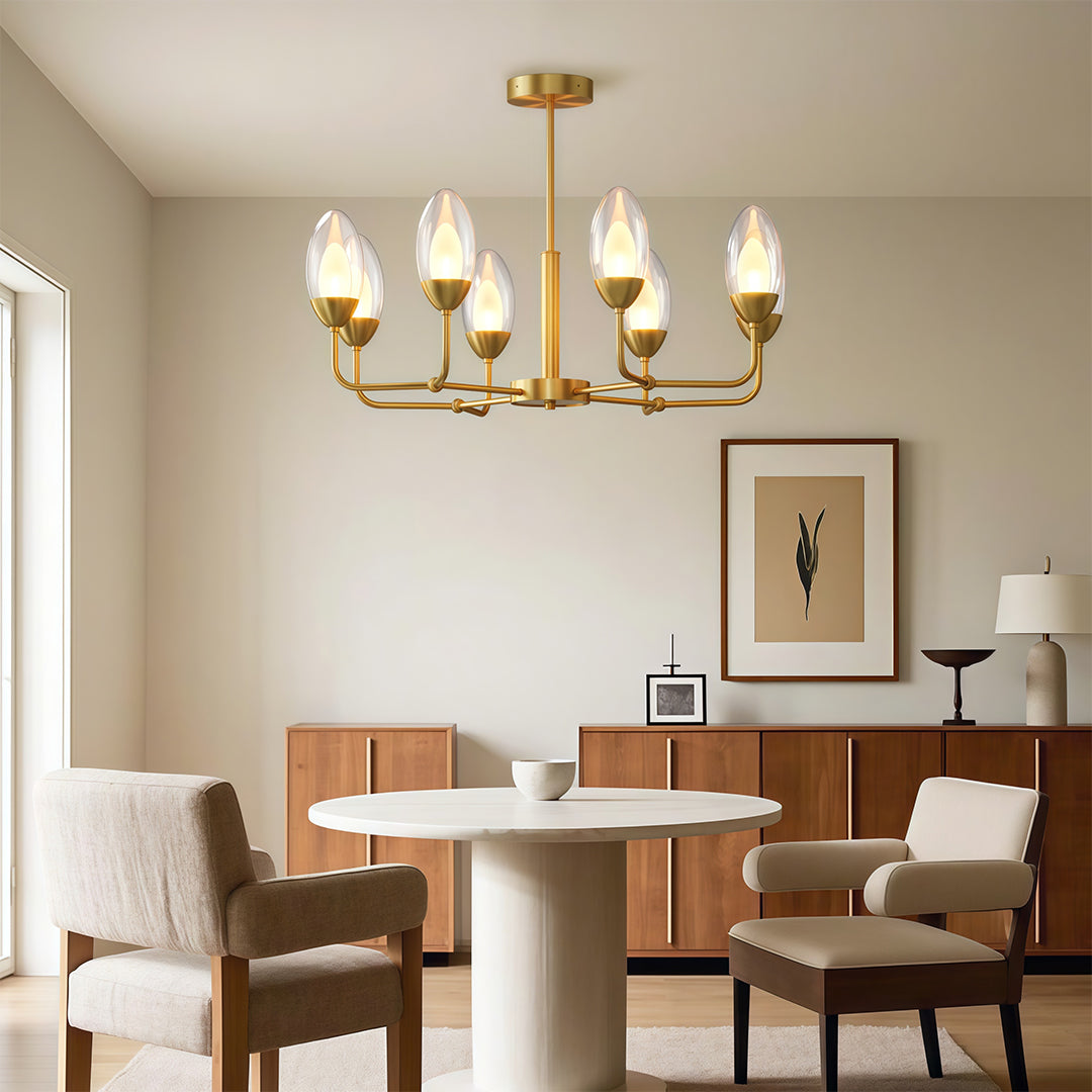 Designer modern minimalist chandelier with glass shade chandelier styling illuminating mid-century modern dining space.
