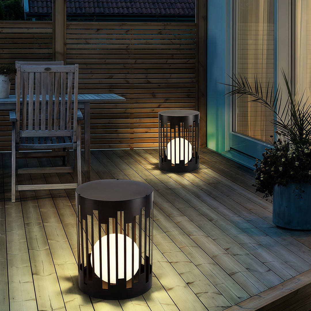 Designer outdoor lantern light featuring glass shade chandelier aesthetic illuminating modern outdoor patio at dusk beside pool.