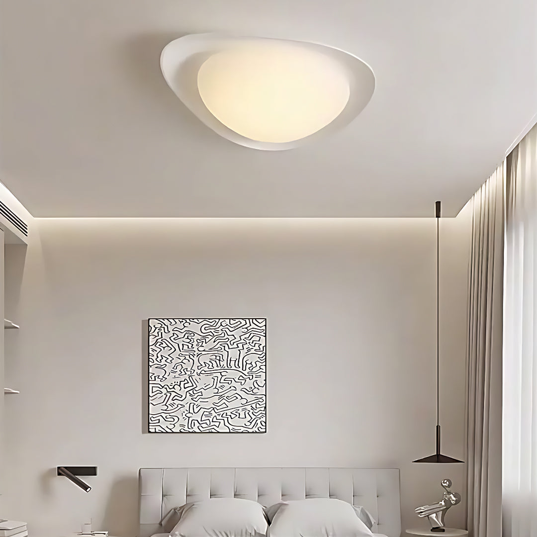Designer pebble ceiling light providing sophisticated illumination in minimalist living room