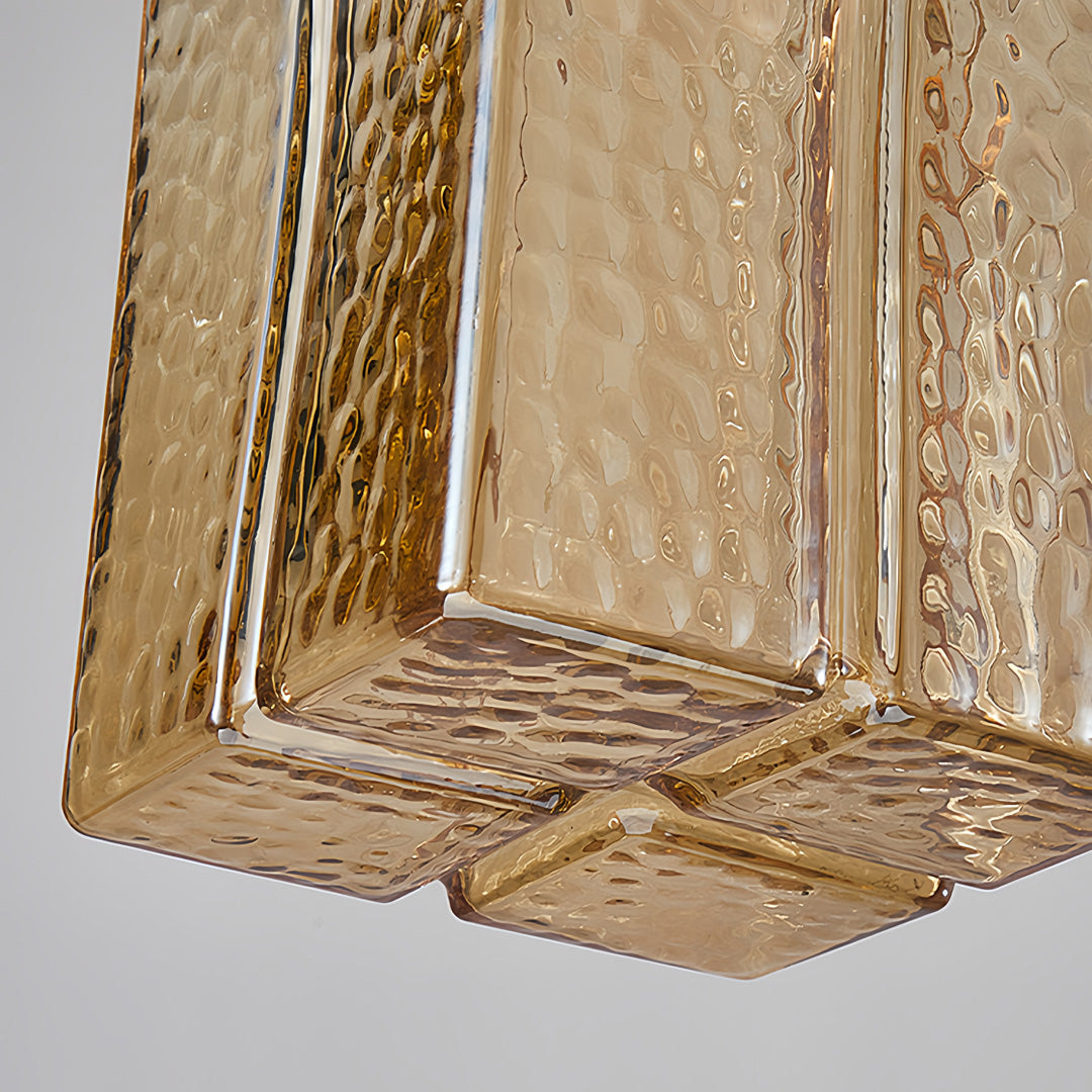 Designer square glass pendant lights in modern kitchen with clean lines and sophisticated interior styling