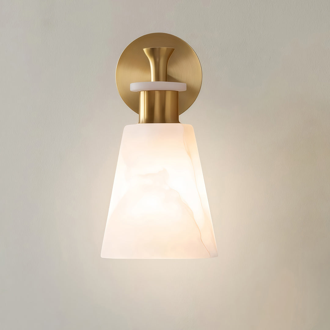 Designer wall sconce LED light featuring glass shade chandelier aesthetic with sleek gold hardware and frosted conical diffuser.