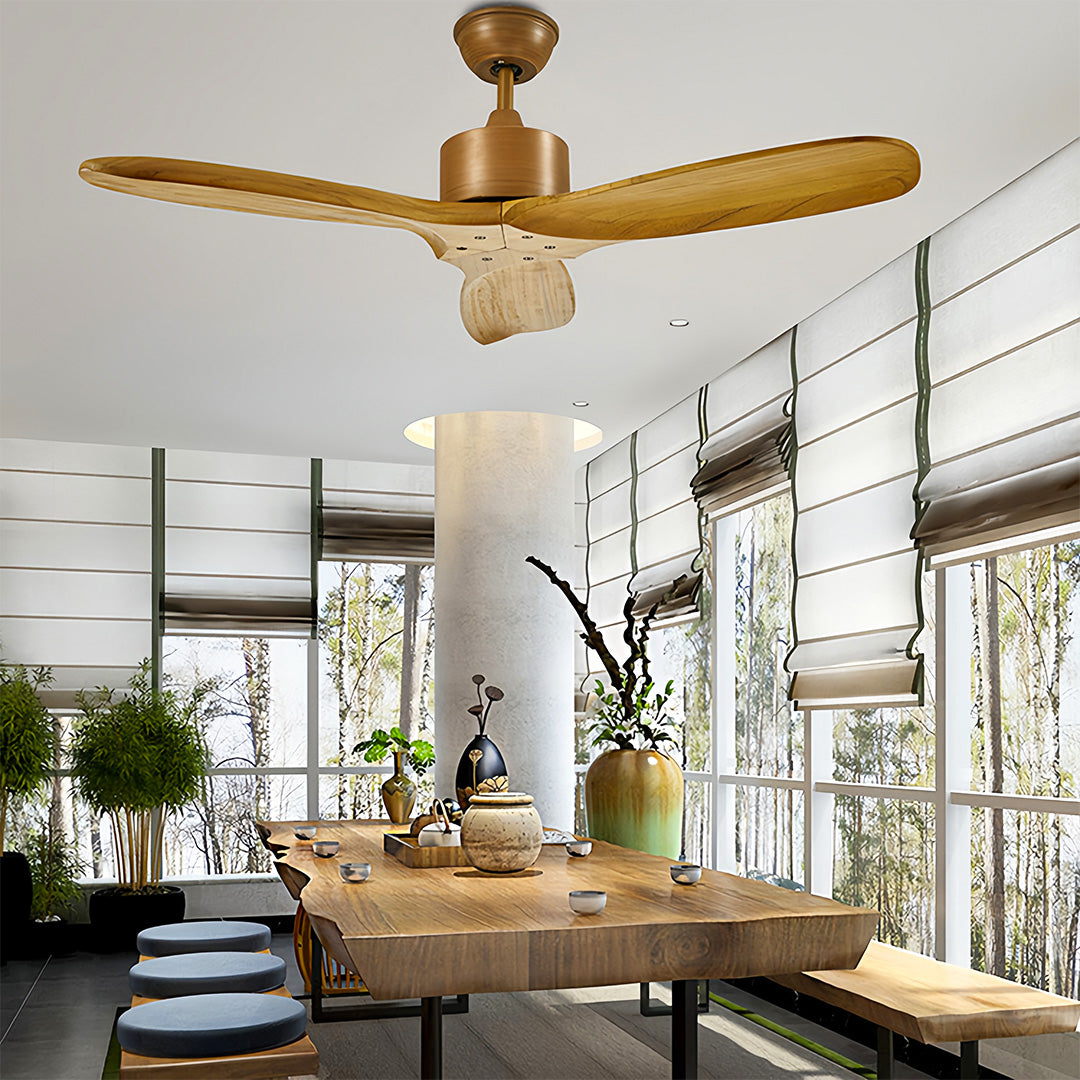 Designer wooden ceiling fans with light with natural wood tones in bright contemporary space