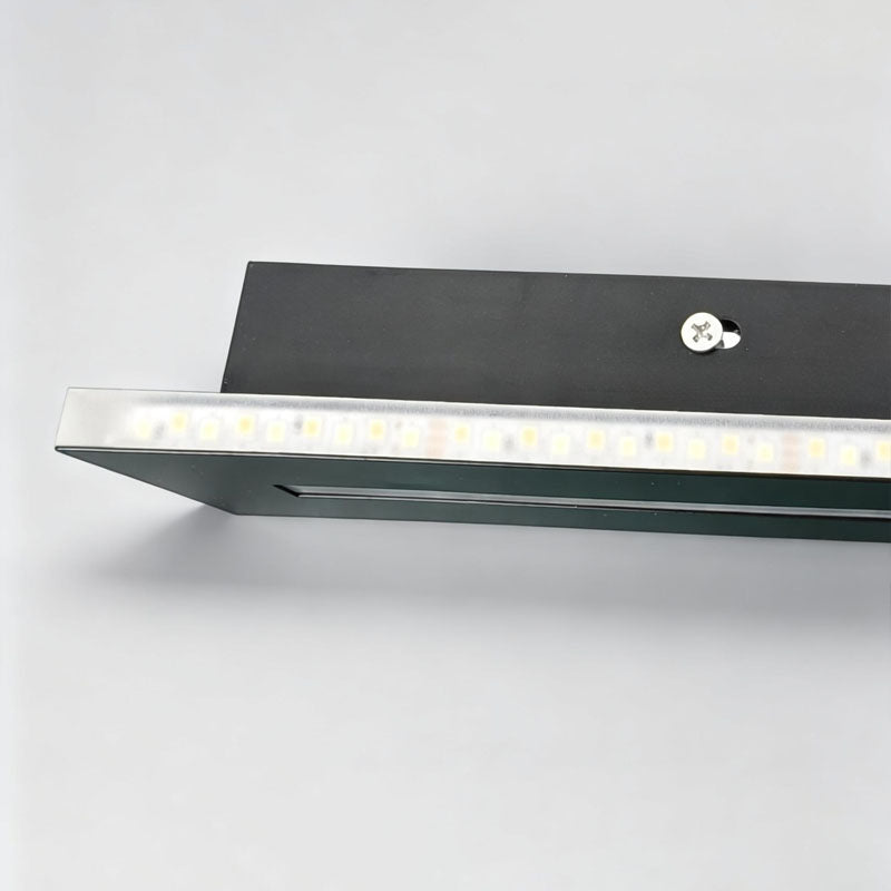 Close up detail of LED chips inside long black wall sconces lighting fixture.