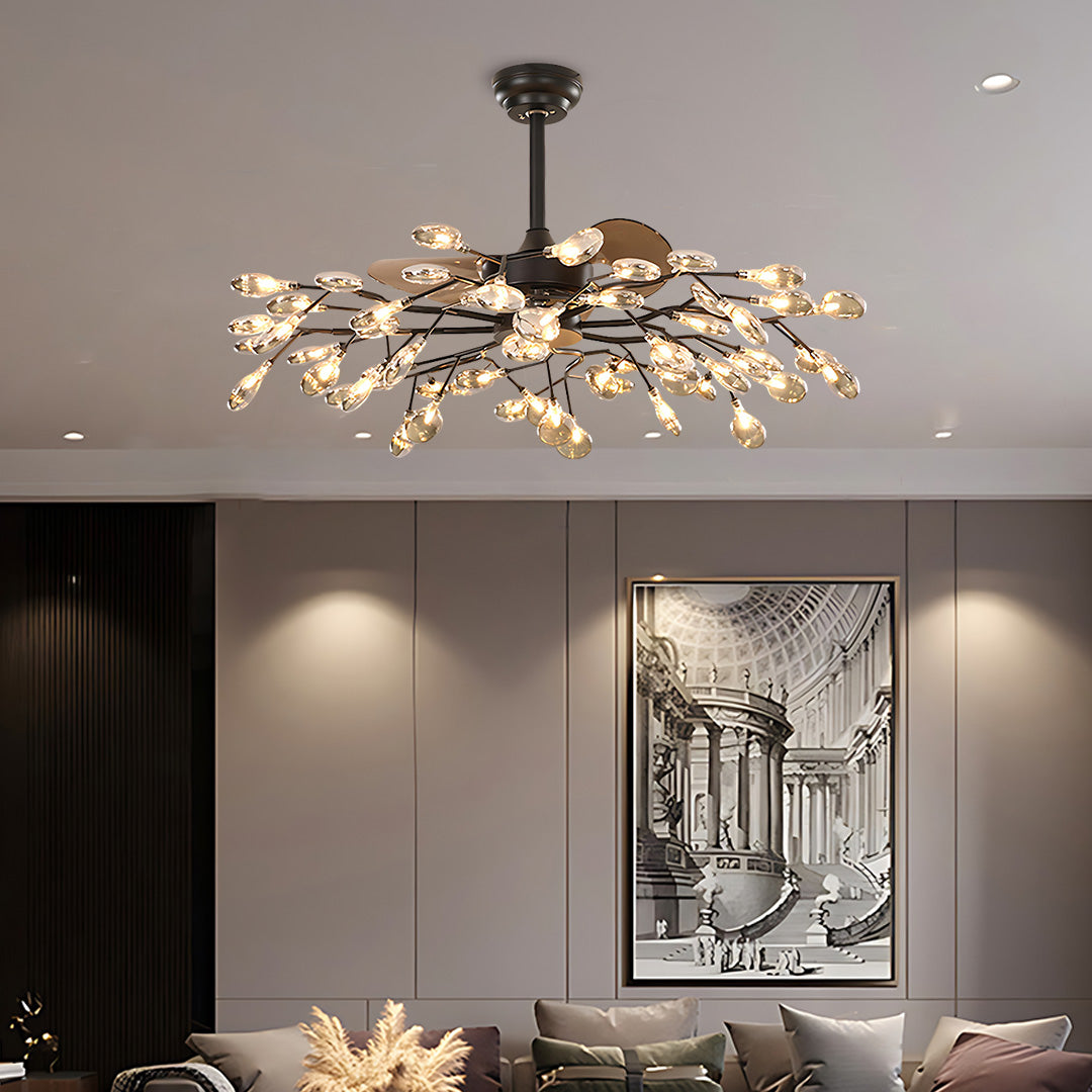 Glam ceiling fan with light illuminating contemporary dining space with neutral decor and artwork