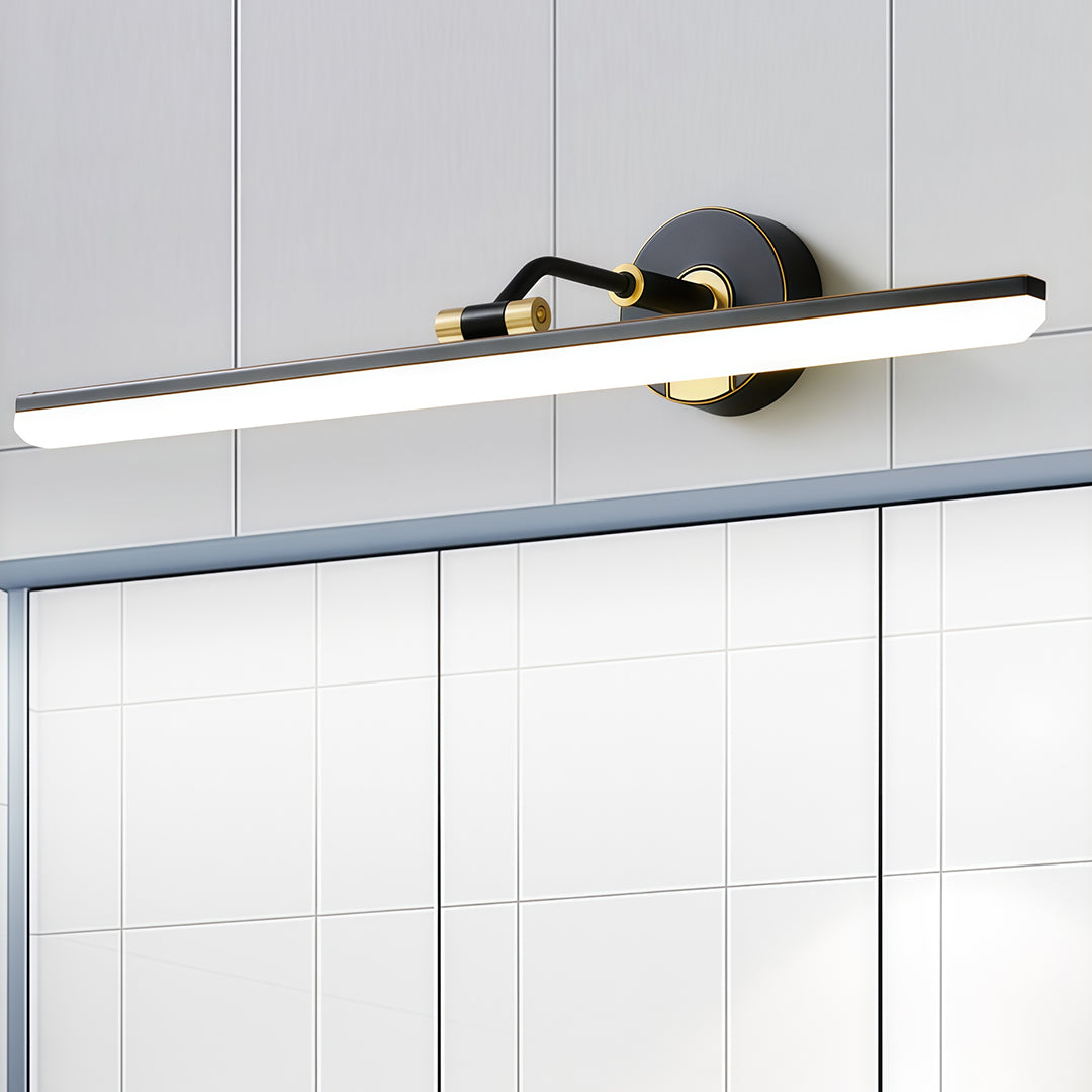 Detailed view of bathroom vanity LED light, emphasizing the gold accents and modern aesthetic.
