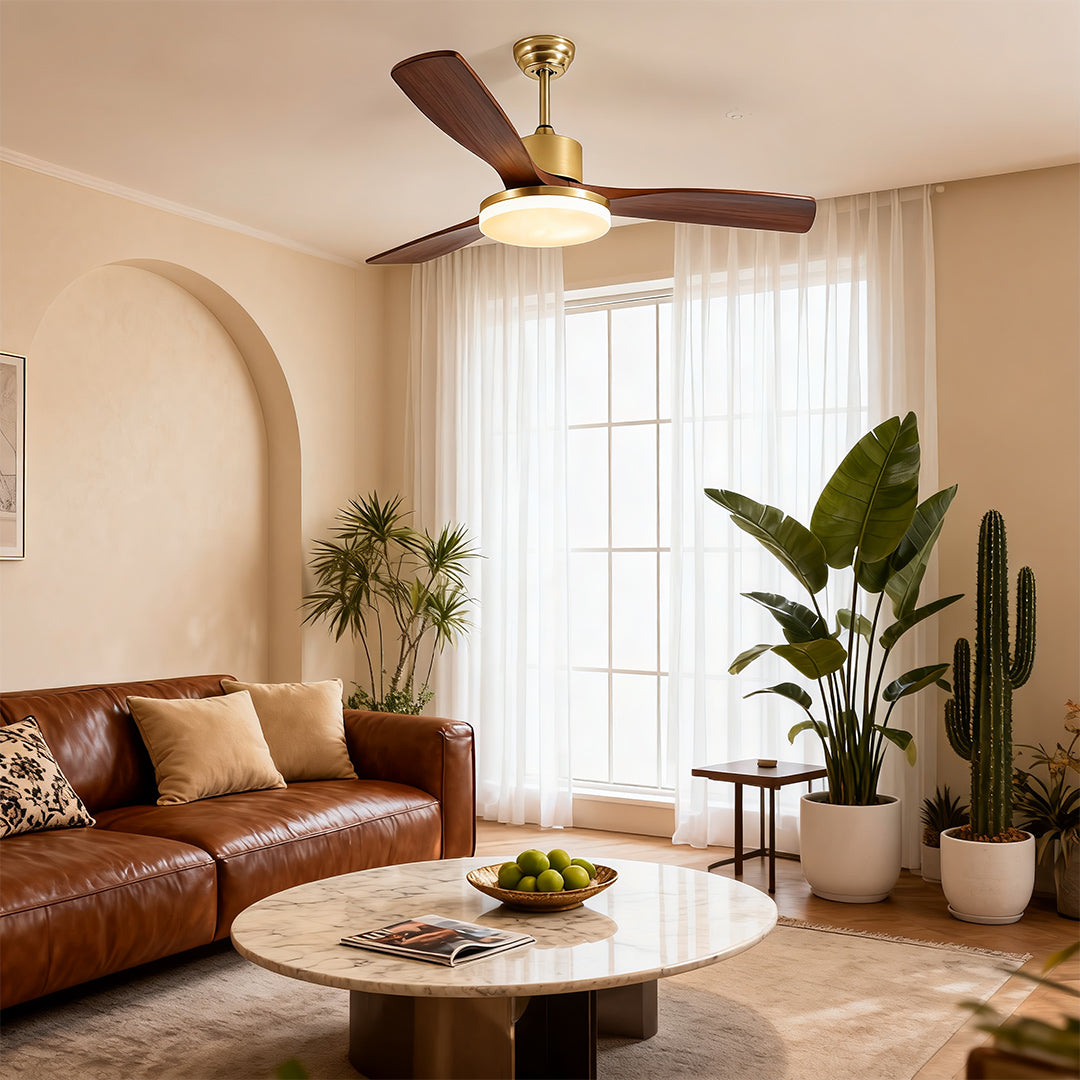 Detailed view of ceiling fan blades, showcasing the wooden texture and gold trim.