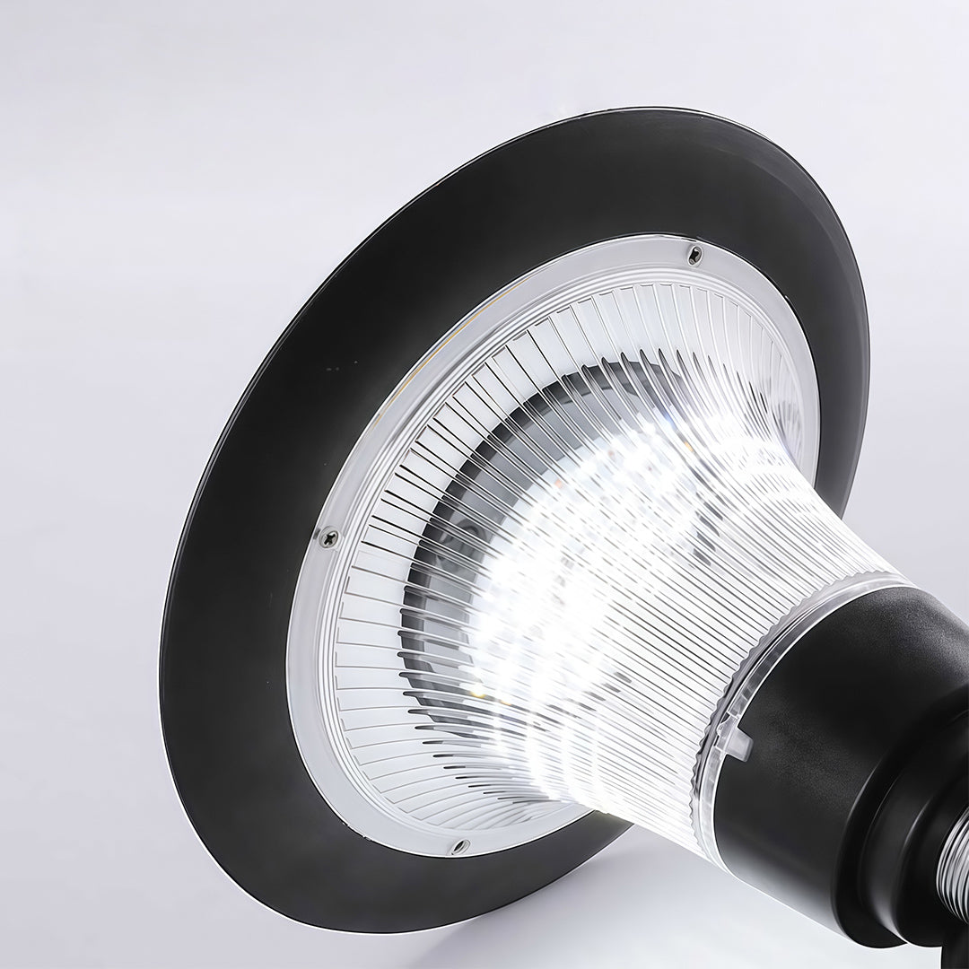 Detailed close-up of the textured clear diffuser on the outdoor solar wall sconce