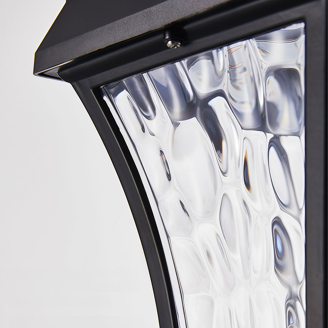 Detailed close-up of the wavy, textured glass diffuser on the solar outdoor sconce lights fixture.
