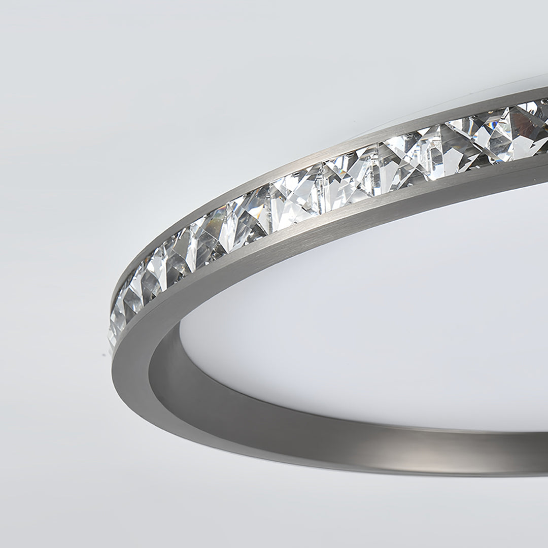 Detailed view of round flush mount LED light showing intricate crystal pattern and warm illumination