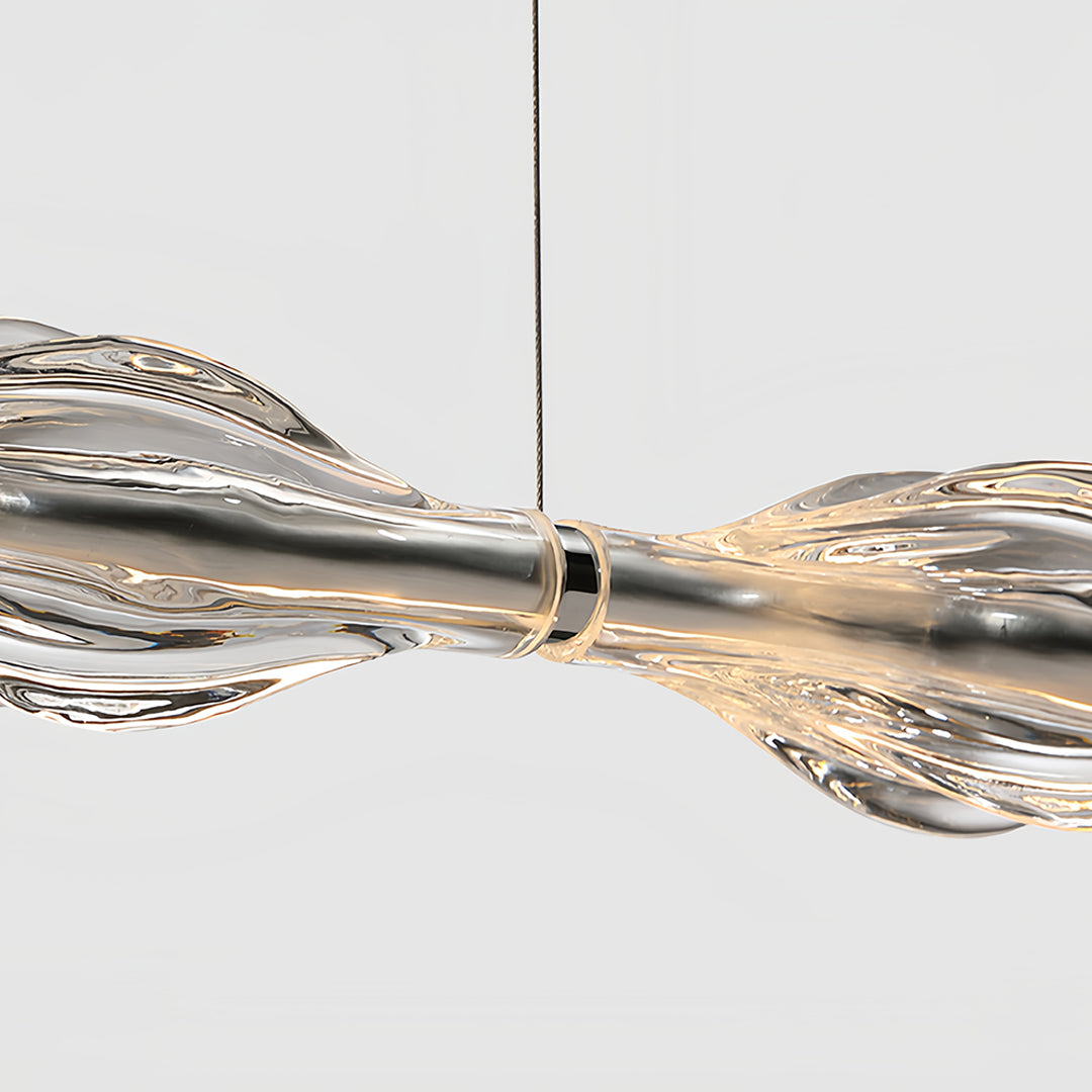 Detailed view of crystal pendant lights for kitchen island, highlighting the unique crystal texture and design.