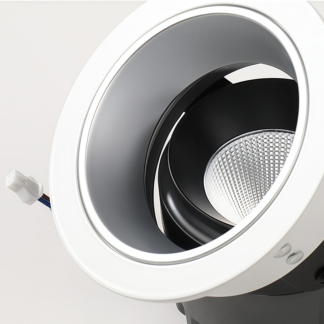 Detailed view of flush mount spotlights featuring glass shade chandelier design showing precision COB LED and reflector optics.