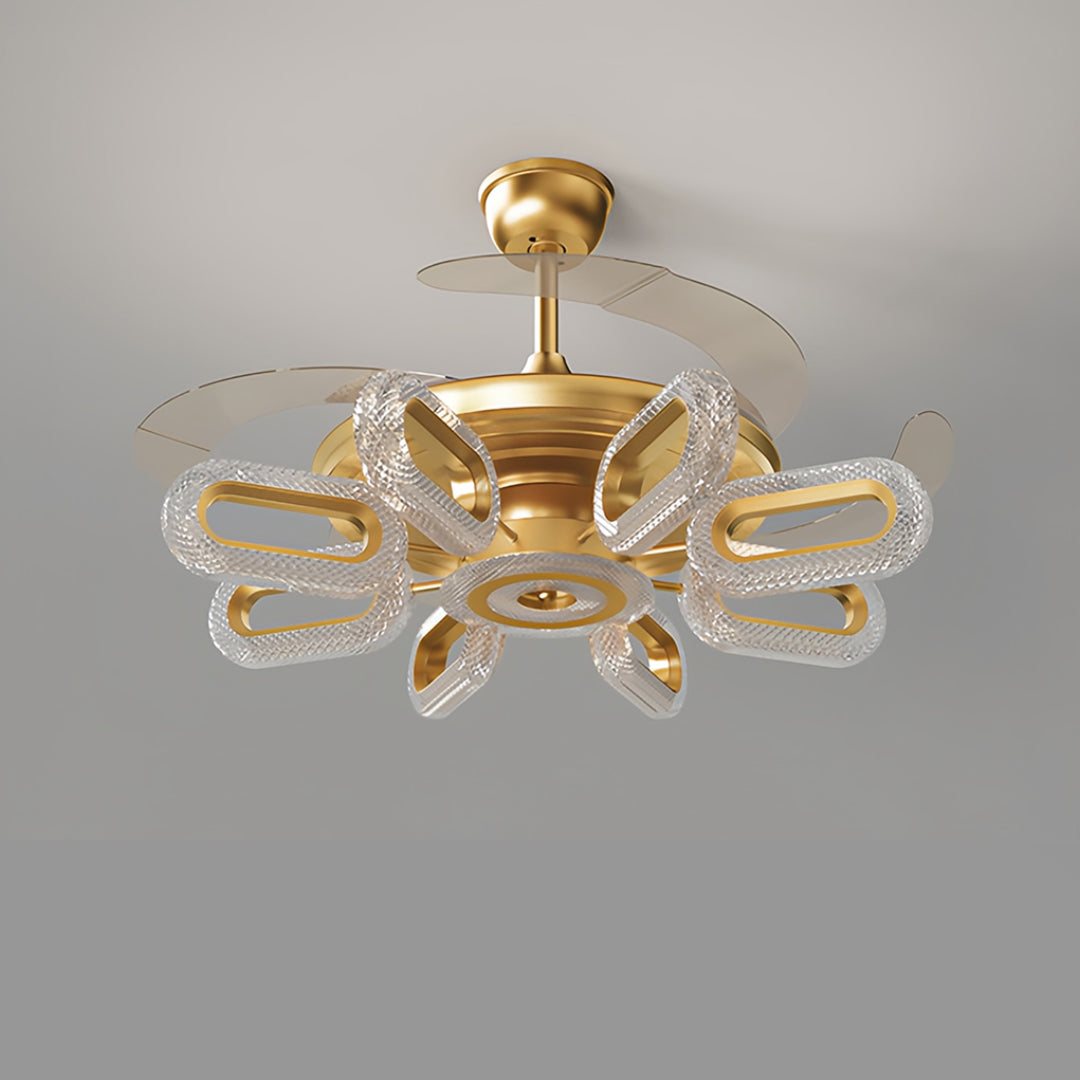 Detailed view of gold ceiling fans with lights, emphasizing the unique and luxurious blade design