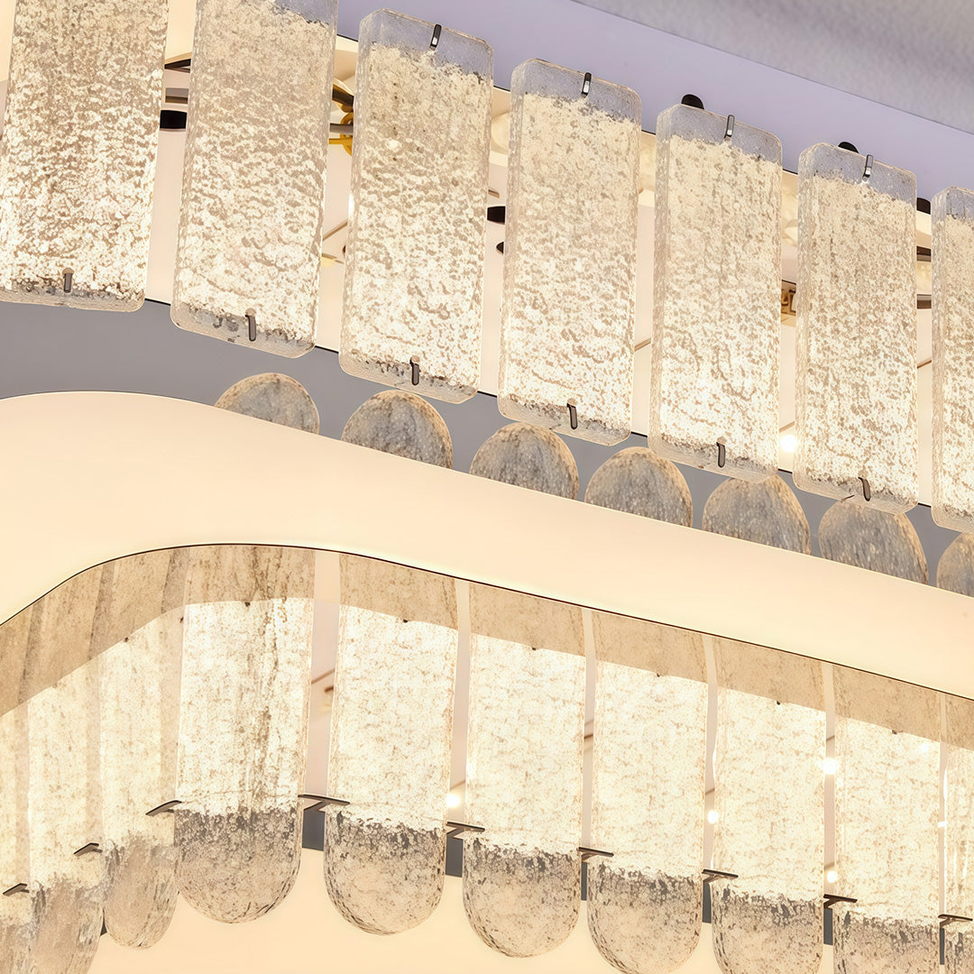 Detailed view of modern flush mount light fixtures featuring glass shade chandelier aesthetic with intricate crystal ball embellishments.