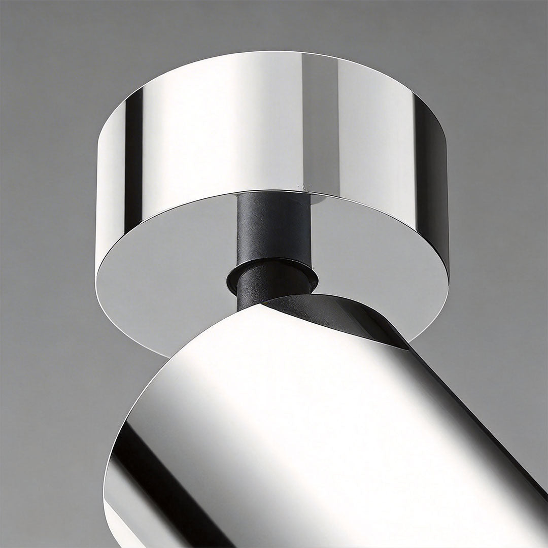 Detailed view of spotlight light fixture showing chrome finish and beam angle.