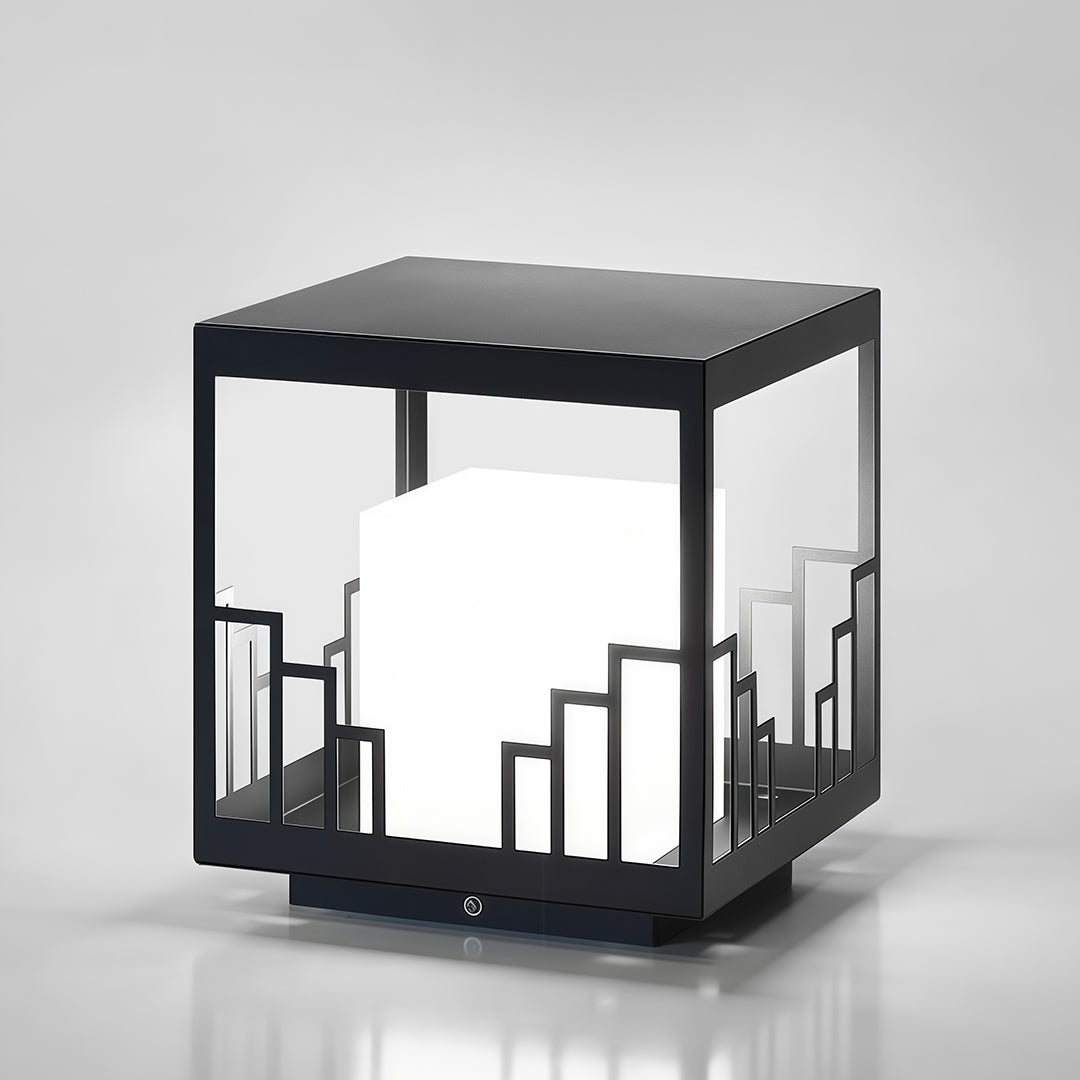 Detailed view of outdoor pillar light with glass shade chandelier styling showing construction and geometric frame detail.