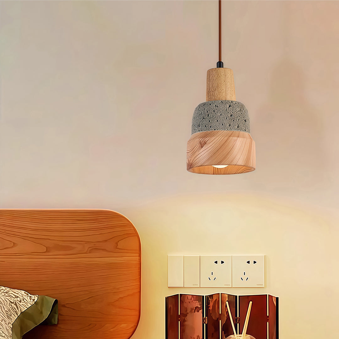 A detailed view of a wood pendant light showcasing the textured woven shade and warm illumination.