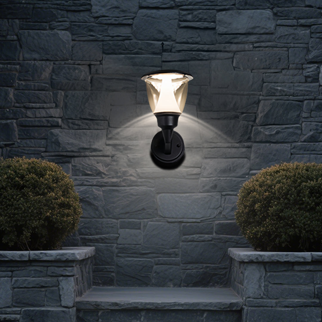 Warm LED wall light illuminating textured brick surface creating dramatic architectural lighting effects