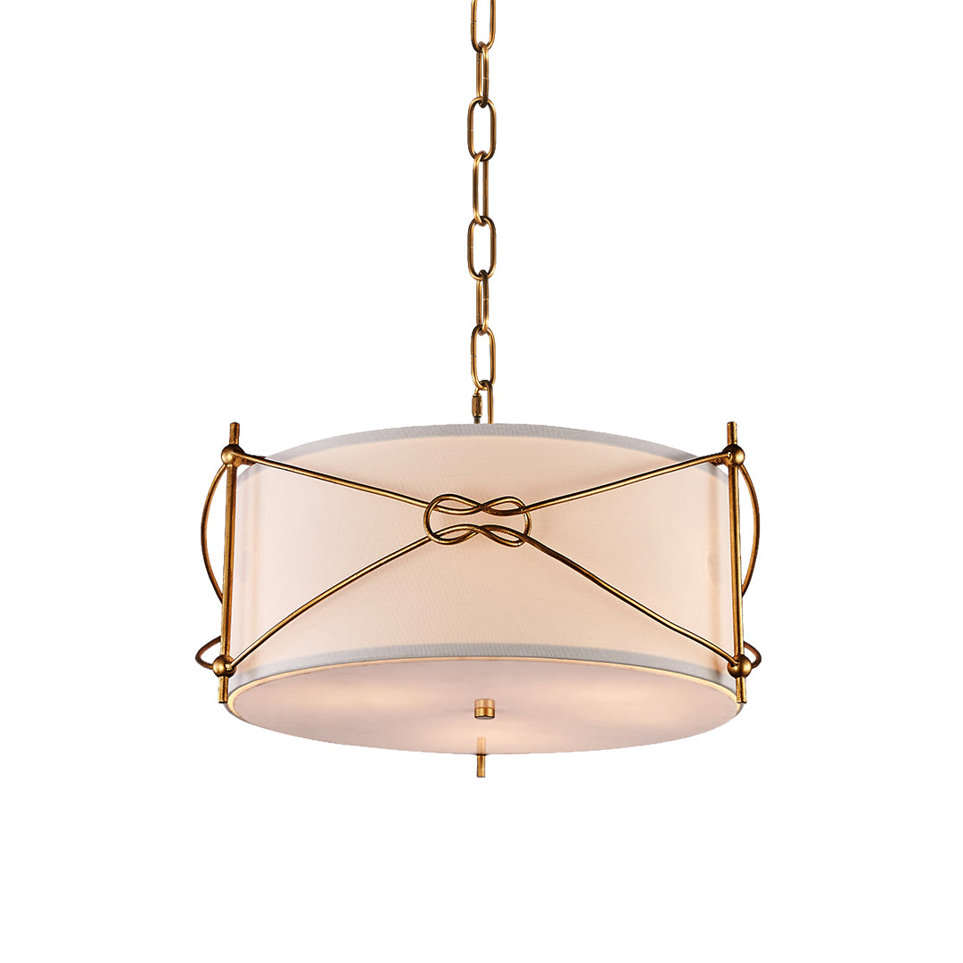 Close-up of the white drum pendant light from a lower angle, highlighting the diffused light from the round fabric shade.